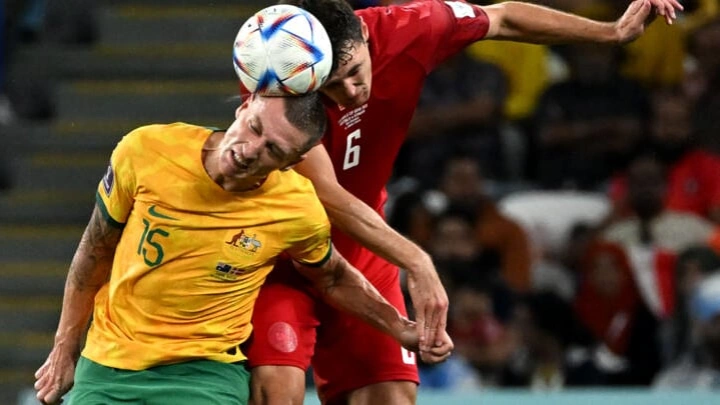 Australia makes it to the World Cup's round of 16 and sends Denmark home