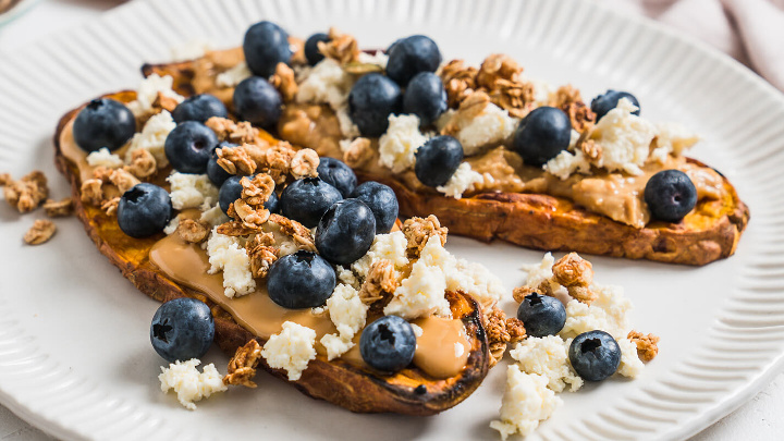Sweet potato toast with peanut butter, ricotta and blueberries