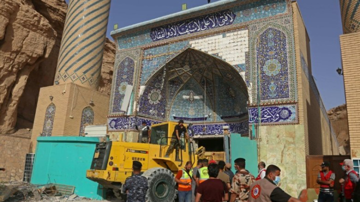 Eighth body pulled from Iraq shrine landslide