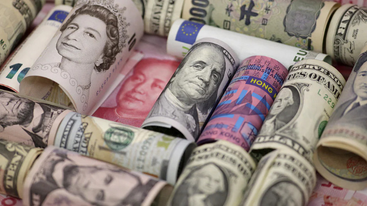 Euro, Hong Kong dollar, US dollar, Japanese yen, British pound and Chinese 100-yuan banknotes are seen in a picture illustrationReuters file photo