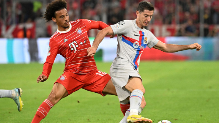Bayern Munich's Leroy Sane against Barcelona's Robert Lewandowski