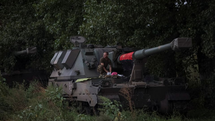 A Ukrainian serviceman stands at a Polish self-propelled howitzer Krab, amid Russia's attack on Ukraine in Kharkiv region,Ukraine September 13, 2022. REUTERS/Gleb Garanich