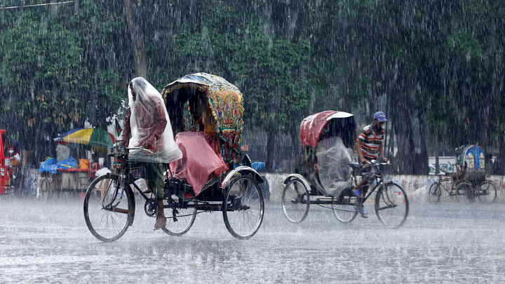 Rickshaws pass on the street as it rains in Dhaka, Bangladesh, on 10 May 2022Reuters file photo