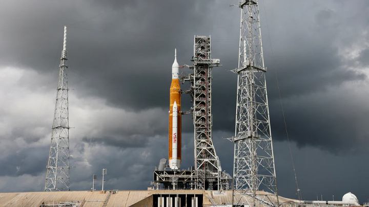 NASA's next-generation moon rocket, the Space Launch System (SLS) with the Orion crew capsule perched on top, stands on launch complex 39B as rain clouds move into the area before its rescheduled debut test launch for the Artemis 1 mission at Cape Canaveral, Florida, USA on 2 September, 2022Reuters