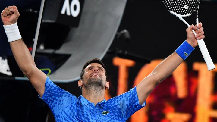 Serbia's Novak Djokovic celebrates after winning against Spain's Roberto Carballes Baena during their men's singles match on day two of the Australian Open tennis tournament in Melbourne early on 18 January, 2023. AFP