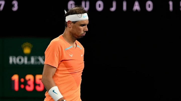 Spain's Rafael Nadal reacts as he leaves for a medical time out during his men's singles match against Mackenzie McDonald of the US on day three of the Australian Open in Melbourne on 18 January, 2023. AFP