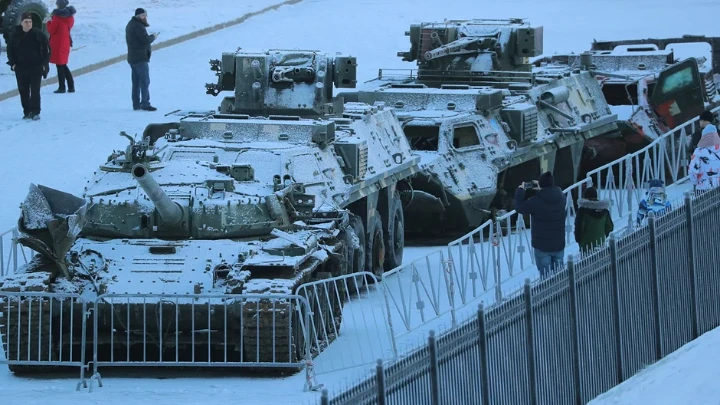 People visit an exhibition of Ukrainian military vehicles destroyed during Russia-Ukraine conflict, at the museum "Breakthrough of the Siege of Leningrad" in Kirovsk, Leningrad region, Russia January 21, 2023. (Reuters)