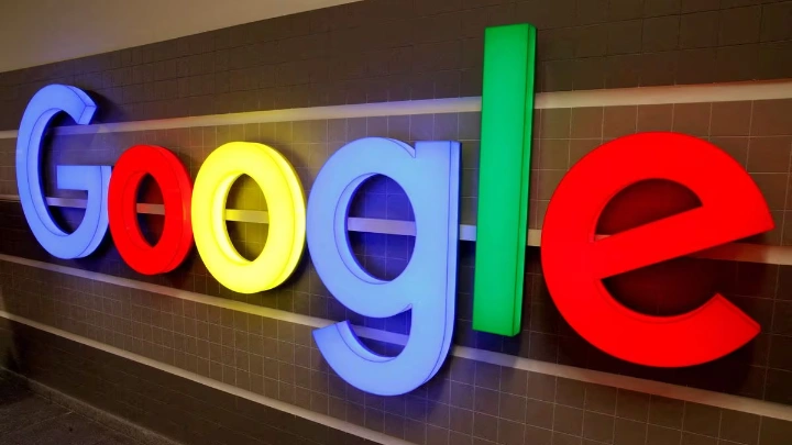 An illuminated Google logo is seen inside an office building in Zurich, Switzerland December 5, 2018. REUTERS/Arnd Wiegmann Acquire Licensing Rights