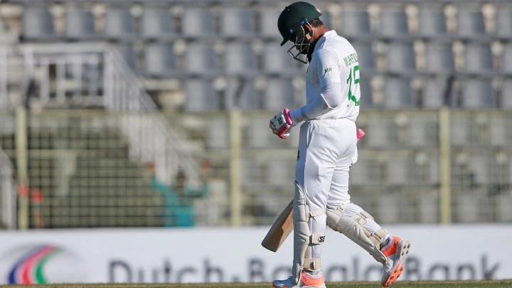 Bangladesh's Mushfiqur Rahim walks off after being dismissed. Photo: Firoz Ahmed