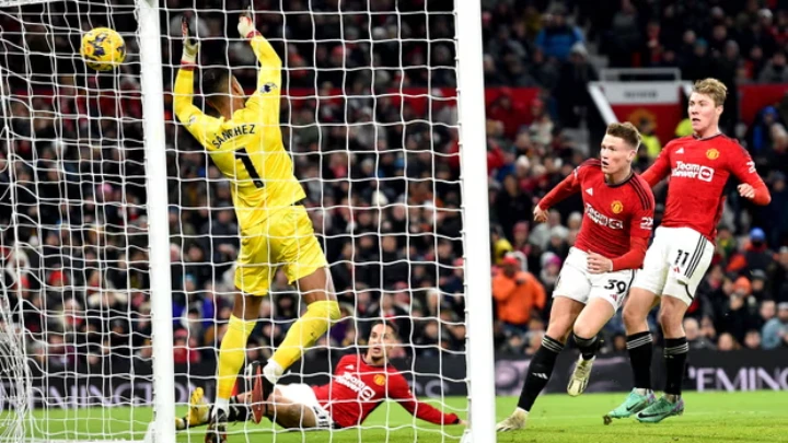 Scott McTominay (No 39) sees his back-post header beat Chelsea’s Robert Sánchez to make it 2-1 to Manchester United. Photograph: Peter Powell/EPA