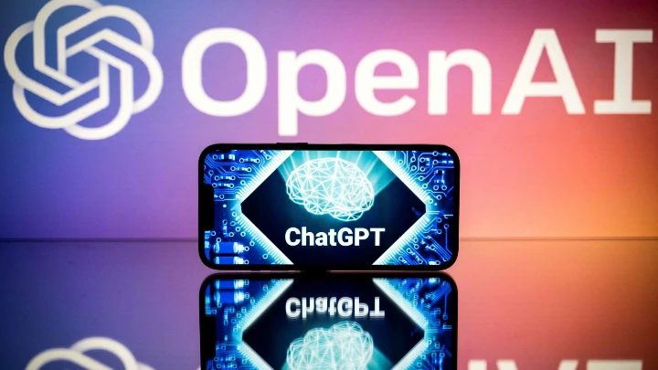 Screens display the logos of OpenAI and ChatGPT, in Toulouse, France, Jan. 23, 2023 AFP