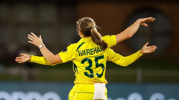 Australia's Georgia Wareham (C) celebrates after the dismissal of Bangladesh's Sobhana Mostary (not seen) during the Group A T20 women's World Cup cricket match between Australia and Bangladesh at St George's Park in Gqeberha on 14 February, 2023. AFP