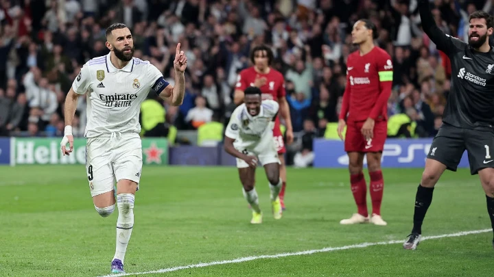 Real Madrid's Karim Benzema celebrates scoring his team's first goal during their UEFA Champions League last 16 second leg match against Liverpool at the Santiago Bernabeu stadium in Madrid on March 15, 2023. Photo: AFP