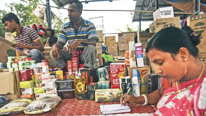 Shopkeepers wait for customers at a stall at a border haat in Mokamia, Feni. Currently, seven haats along the Indian border are being operated and the number will be increased in the future, Indian High Commissioner Pranay Verma said. Photo: Star/file
