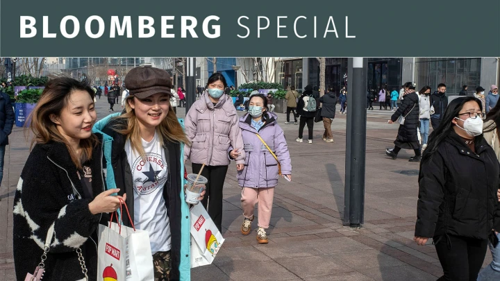 Shoppers walk through Beijing’s Wangfujing retail area in February. China’s malls are buzzing again after the country dropped virus restrictions. Photo: Bloomberg