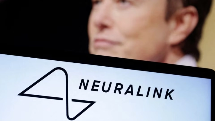 Neuralink logo and Elon Musk photo are seen in this illustration taken, December 19, 2022. REUTERS/Dado Ruvic/Illustration/