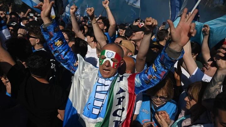 Champions Napoli return home as city revels in victory hangover
