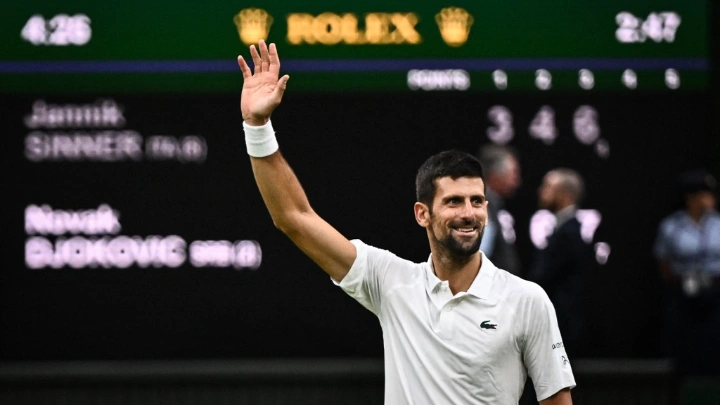 Serbia's Novak Djokovic celebrates winning against Italy's Jannik Sinner in Friday’s Wimbledon semi-final in London AFP
