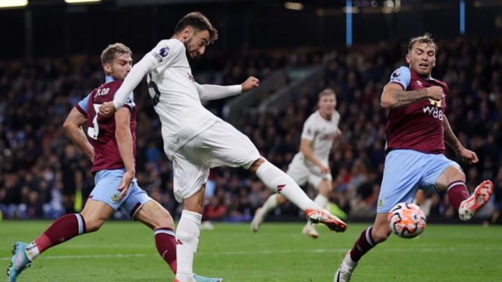 Manchester United’s Bruno Fernandes volleys home the all-important goal during Saturday’s Premier League match away to Burnley Photo: Reuters