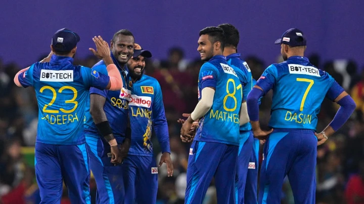 Sri Lanka's Angelo Mathews (2L) celebrates with teammates after taking the wicket of Afghanistan's Ibrahim Zadran at the Rangiri Dambulla International Cricket Stadium in Dambulla on February 19, 2024. Photo: AFP