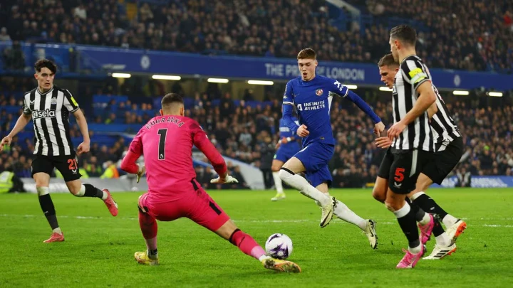 Soccer Football - Premier League - Chelsea v Newcastle United - Stamford Bridge, London, Britain - March 11, 2024 Newcastle United's Martin Dubravka in action with Chelsea's Cole Palmer Action Images via Reuters/Matthew Childs