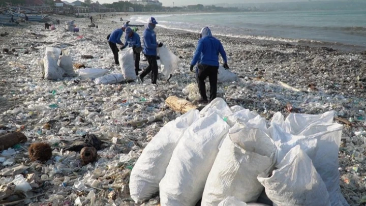 Trash tidal wave coats normally pristine Bali beach