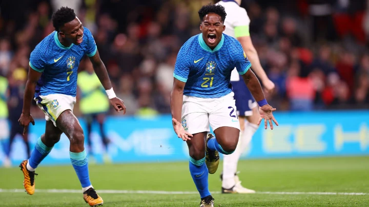 Brazil's Endrick celebrates scoring their first goal with Vinicius Junior. PHOTO: REUTERS