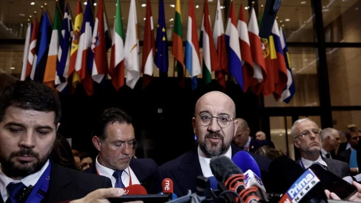 European Council President Charles Michel speaks to journalists at the end of the first day of a European Union summit at the EU headquarters in Brussels on April 18, 2024. © Kenzo Tribouillard, AFP