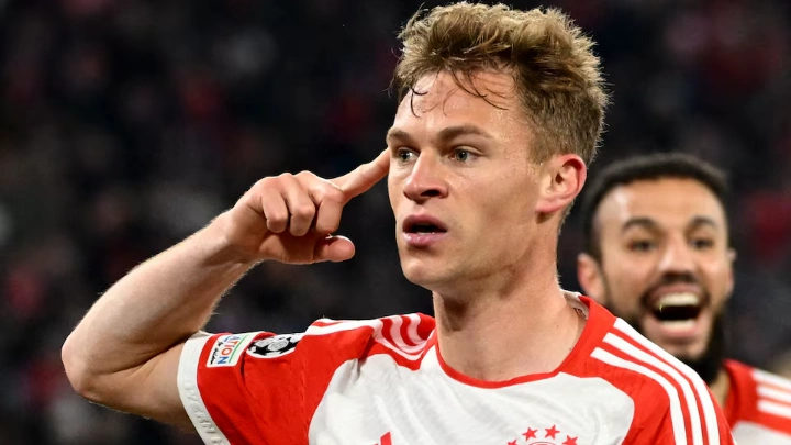 Soccer Football - Champions League - Quarter Final - Second Leg - Bayern Munich v Arsenal - Allianz Arena, Munich, Germany - April 17, 2024 Bayern Munich's Joshua Kimmich celebrates scoring their first goal REUTERS/Angelika Warmuth