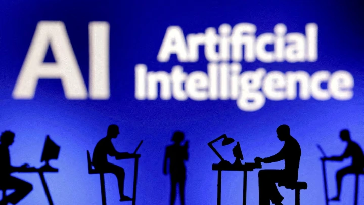 Figurines with computers and smartphones are seen in front of the words "Artificial Intelligence AI" in this illustration taken, February 19, 2024. REUTERS/Dado Ruvic/Illustration/File Photo 