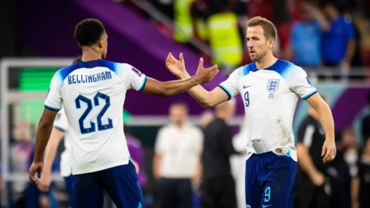 England’s Harry Kane celebrates with Jude Bellingham