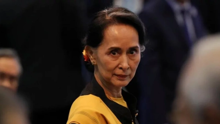 Why was Aung San Suu Kyi moved to house arrest?