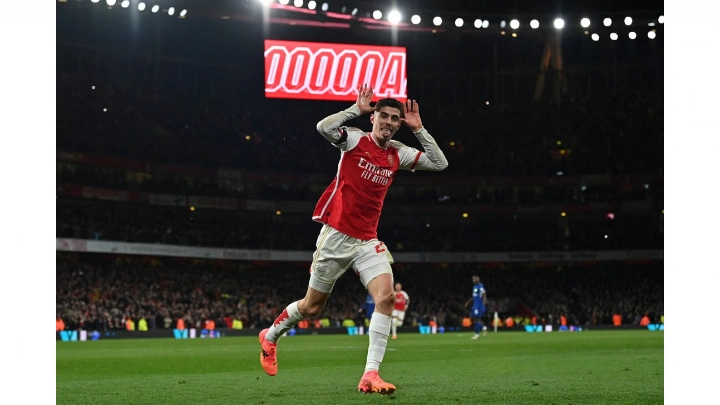 Arsenal's German midfielder #29 Kai Havertz celebrates after scoring their third goal during the English Premier League football match between Arsenal and Chelsea at the Emirates Stadium in London on April 23, 2024. Photo: AFP