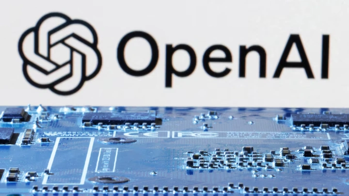 OpenAI logo is seen near computer motherboard in this illustration taken January 8, 2024. REUTERS/Dado Ruvic/Illustration/File Photo