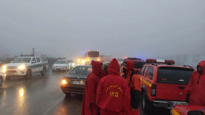 In this photo provided by MojNews on May 19, 2024, rescuers gather before heading towards the site of the "accident" involving a helicopter in the convoy of Iran's President in the Jolfa region of the western province of East Azerbaijan. Photo : AFP