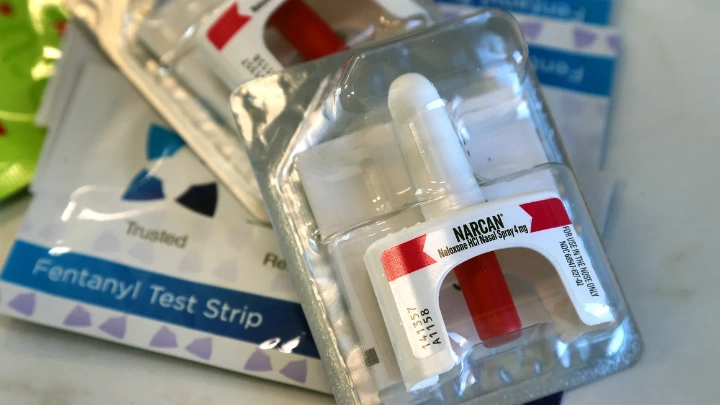 An estimated 107,500 people died from a drug overdose in the US in 2023, a 3% decrease from 2022, according to provisional CDC data. Narcan and fentanyl test strips can help reduce risk. John Tlumacki/The Boston Globe/Getty Images