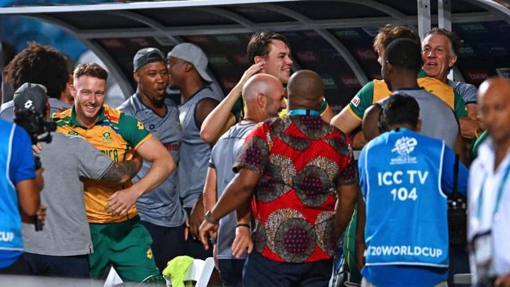 South Africa's players and staff celebrate their victory in the ICC men's Twenty20 World Cup 2024 semi-final cricket match between South Africa and Afghanistan at Brian Lara Cricket Academy in Tarouba, Trinidad and Tobago, on June 26, 2024. Photo: AFP