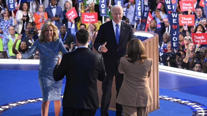 Biden says will be 'best volunteer' for Harris campaign US First Lady Jill Biden (L) and US President Joe Biden (2nd R) walk to hug US Second Gentleman Douglas Emhoff and US Vice President and 2024 Democratic presidential candidate Kamala Harris (R) after Biden spoke onstage on the first day of the Democratic National Convention (DNC) at the United Center in Chicago, Illinois, on August 19, 2024. Photo : AFP