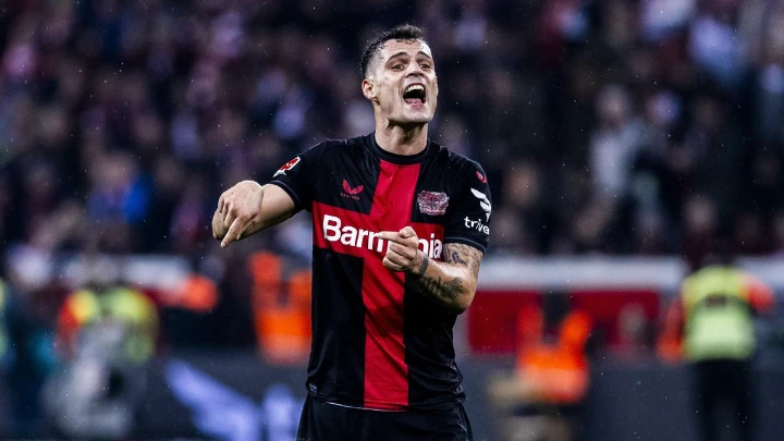 Reborn Xhaka vows to keep record-breaking Leverkusen on top
